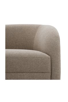 a close up view of the back end of a couch with a light brown fabric