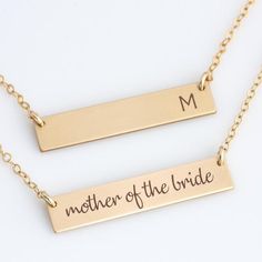 Our reversible mother of the bride double sided necklace can be personalized with words, numbers, symbols in the font of your choice. Engraved and hand assembled with care and love, it comes in 14k gold fill, rose gold fill, or sterling silver. A perfect gift for your bridesmaids, mother of the Customizable Gold Name Necklace For Wedding, Mother's Day Nameplate Jewelry With Engraved Text, Customizable Name Necklace For Wedding And Mother's Day, Mother's Day Nameplate Necklace With Engraved Text, Mother's Day Engraved Nameplate Necklace, Gold Necklace With Engraved Text For Mother's Day, Mother's Day Wedding Nameplate Necklace, Mother's Day Necklace With Engraved Text, Customizable Necklaces For Bridesmaid Gift On Mother's Day