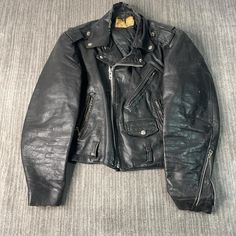 Vintage 70s Excelled Leather Motorcycle Biker Style Talon Zipper Multiple Pocket Black Zip Up Jacket Large Mens Condition:  Fair Used Condition  = Rip On The Neckline Due To Age And Wear Measurements: Please see photos above for all measurements IF YOU BUY TWO OR MORE ITEMS USE THE CODE BUNDLE @ CHECK TO SAVE 20% WE SHIP WITHIN 24 HOURS AFTER PURCHASE! Please be aware that we do not offer free returns!! The Buyer is responsible for the cost of the return label.  Follow us on TikTok & Instagram @findsnostalgic and tag us in your finds Vintage Biker Jacket, Vintage Mens Fashion, Vintage Biker, Motorcycle Club, Saint Paul Mn, Black Zip Ups, Mens Vintage, Biker Style, Saint Paul