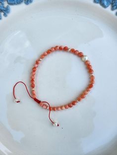 Beaded adjustable fresh water pearl and pink coral bracelet. Measures at 7.5 in. Fresh Water Pearl Bracelet, Coral Bracelet, Freshwater Pearl Bracelet, Fresh Water Pearl, Water Pearls, Pink Coral, Honolulu, Pearl Bracelet, Fresh Water