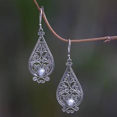 Shining tendrils form an intricate filigree lace. Crafted by hand these exquisite earrings from Komang Wijayana feature the glow of cultured pearls. White Intricate Design Drop Earrings, White Intricate Dangle Jewelry, White Bohemian Earrings With Intricate Design, Ornate Pearl Earrings As Gift With Intricate Design, Ornate Teardrop Jewelry With Intricate Design, White Bohemian Filigree Earrings, Ornate White Filigree Earrings, White Intricate Design Dangle Earrings, Gift White Pearl Earrings With Intricate Design