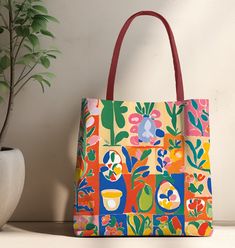 This design has all the colors of Spring. A perfect bag for all your beach paraphernalia, or great for shopping or as a book bag, for knitting - anything! Available in three sizes to add both versatility and style, these polyester tote bags come with a choice of handle colors. Featuring double-stitched seams, cotton webbing straps, and nonwoven laminate lining for high-end durability. One single storage compartment (no pockets), and no closure. Small: 13 x 13in; Medium: 16 x 16in; Large 18 x 18i Red Eco-friendly Canvas Shopping Bag, Casual Multicolor Canvas Shopping Bag, Rectangular Multicolor Beach Bag For Everyday Use, Casual Tote Shoulder Bag As Gift, Casual Tote Shoulder Bag For Gift, Playful Multicolor Shoulder Bag As Gift, Playful Multicolor Shoulder Bag Gift, Artsy Rectangular Summer Bag, Artsy Rectangular Summer Bags