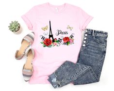 Show off your love for the city of lights with this beautiful floral Paris shirt! A lovely gift for students and teachers of French! Want a different design or color? Just let me know and I'll make it happen! FIT & SIZING : * These soft and lightweight Bella-Canvas unisex t-shirts have just the right amount of stretch, and are made in the USA. * Tees are comfortable and flattering for both men and women. * Please see the size chart in the photos to obtain an accurate size. Measure one of your fa Pink Shirt For Spring Gift, Pink Shirt As Spring Gift, Casual Pink T-shirt With Rose Print, Casual Pink Rose Print T-shirt, Casual Cotton T-shirt With Rose Print, Trendy Rose Print T-shirt For Spring, Paris Streetwear, Paris Shirt, T-shirt Print Design