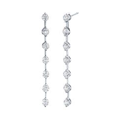 Finely crafted from 18K Gold with glittering, hand-selected diamonds along a sleek, elegant line drop silhouette, these diamond earrings are the perfect statement piece for any look. Enhance your collection with 3.36ct of pure luxury. Statement Pieces, Diamond Earrings, 18k Gold, Diamonds, White Gold, Yellow Gold, Glitter, Sleek, Drop Earrings