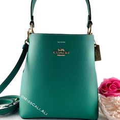 100% Authentic Brand New With Tag Sold Out In All Stores Excellent Gift - Includes Gift Bag Nwt Coach Small Town Bucket Bag In Beautiful Jade Color Soft Leather With Pink Interior. [Bag] Color: Gold/Bright Jade Double Face Leather Center Zip Compartment Snap Closure Handle With 6 3/4" Drop Detachable Strap With 22" Drop For Shoulder Or Crossbody Wear 8 1/2" (L) X 8 3/4" (H) X 4" (W) Includes:Coach Price Tag,Care Card & Gift Bag Fast Shipping Smoke-Free Home Green Coach Shoulder Bag For Evening, Formal Green Coach Bag, Green Formal Bucket Bag, Elegant Green Crossbody Bucket Bag, Coach Green Bag With Gold-tone Hardware, Coach Green Shoulder Bag With Gold-tone Hardware, Green Coach Shoulder Bag With Gold-tone Hardware, Elegant Green Bucket Bag With Adjustable Strap, Green Crossbody Bucket Bag With Gold-tone Hardware