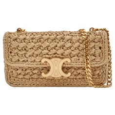 **Please note this is a preorder piece and shipping may take 14-30 days.** Introducing this mini Celine shoulder bag made of raffia. The bag features the brands signature Triomphe motif at the front, snap closure under the motif, beige raffia construction and gold tone hardware. The fold over flap opens to an open matching interior. The bag is perfect for resort and beach wear or to complete your chic summer look. 112252ETU.02VG. Year: 2023. MSRP $5,540 Color: Beige Material: Raffia Comes with: Celine Crochet, Summer Beach Bags, Mini Shoulder Bags, Celine Shoulder Bag, Armpit Bag, Louis Vuitton Speedy 30, Lipstick Bag, Bag Summer, Bags Aesthetic