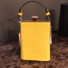 Gorgeous And Very Stylish Purse, Comes With Additional Crossbody Strap. 7.5 H 5.5 W Summer Party Leather Bags, Elegant Yellow Top Handle Box Bag, Yellow Box Bag With Detachable Handle For Evening, Yellow Satchel Shoulder Bag For Party, Elegant Yellow Satchel Box Bag, Chic Yellow Clutch For Daily Use, Elegant Yellow Leather Box Bag, Yellow Party Satchel Shoulder Bag, Chic Yellow Clutch For Formal Occasions