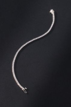 Made with 14k, 18k, and 24k gold or sterling silver, this only-at-Anthro collection is designed with everyday wear in mind. Whether working out, running errands, or heading to dinner, these made-to-last pieces add a glimmer of luxury to every look. | Classic Diamond Tennis Bracelet by Fine Diamonds by Anthropologie in Silver, Women's, Gold/Sterling Silver Tenis Bracelet, Diamond Tennis Bracelet, Tennis Bracelet Diamond, Tennis Bracelet, Silver Bracelets, Running Errands, Working Out, Tennis, Anthropologie