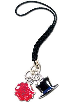 a necklace with a red rose on it and a hat charm hanging from the front