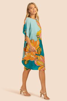 This flattering, top-rated caftan dress is back in a new print for summer. Silky, soft, and gorgeously drapey, this floral caftan dress features 100% Silk Crepe de Chine, making it a luxurious addition to your summer wardrobe. Versatile and getaway-ready, pack this bold dress on your next tropical vacation or wear it to the next breezy beach wedding on your calendar. Boatneck Cap sleeves Relaxed caftan silhouette Placed print Length: 40" Runs true to size Model is 5'10", wearing size S FABRIC: F Bold Dress, Bold Dresses, Global Dress, Coral Print, Cotton Kaftan, Caftan Dress, Tropical Vacation, Silk Crepe, New Print