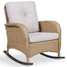 a wicker rocking chair with cushion on an isolated white background for use in any room