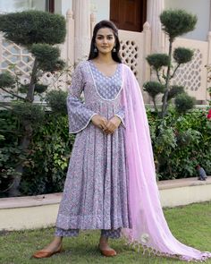 This is a 3-piece set. It comes with soft cotton hand block print anarkali kurta with 32 kali, round neck, 3/4th bell sleeves ankle length.The set also comes with handblock print pants with semi elasticated waistband and kota doria dupatta with gota detailing. Color-Pink & Purple Kurta Fabric-Soft Cotton Bottom Fabric-Cotton Dupatta Fabric-Kota Doria Work-Block Print Neck-Round Neck Sleeves-3/4th Bell Sleeves Washing Care-Dry Clean Only Block Print Anarkali, Printed Anarkali Suits, Anarkali Kurta Set, Cotton Anarkali Suits, Mens Wear Wedding, Cotton Anarkali, Reception Look, Anarkali Kurta, Purple Hands