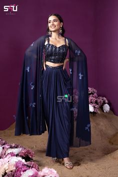 !! Designer Bollywood Collection!! Stylish navy blue Lehenga sari with choli and net jacket. Perfect outfit for Indian weddings or festivals. It is very comfortable and light weight yet stylish and elegant. Details: Blouse Fabric: Georgette Inner : Cotton lined Colour: Blue Sleeves: Sleeveless Embroidery : Cutdana, thread and sequins hand embroidery Lehenga/Skirt Fabric: Crepe Silk Inner : Cotton lined Colour : Blue Design: Ready to wear Lehenga skirt with pre plated saree style. Cape/Jacket  Fa Designer Wear Draped Dupatta With Mirror Work, Designer Draped Dupatta With Mirror Work, Cape Sleeves Saree With Resham Embroidery For Eid, Designer Mirror Work Draped Dupatta, Navratri Draped Sets With Sheer Dupatta, Eid Saree With Resham Embroidery And Cape Sleeves, Navratri Reception Set With Traditional Drape, Designer Draped Choli For Eid, Designer Pre-draped Saree With Cape Sleeves