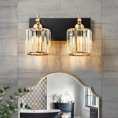 a bath room with a sink and a mirror on the wall next to a tub