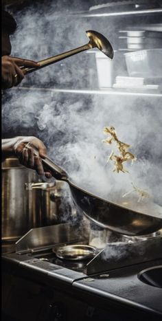 a person cooking food on top of a stove with steam coming out of the pan