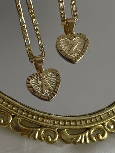 Beautiful heart shaped initial necklace!  * 18k gold plated copper, non tarnish  * 17 inches long (no extension) lays perfectly in the middle of upper chest * perfect for layering * very limited quantity if you want it shorter for a child, please send a message. the chain can be cut! Gold Plated Charm Necklaces With Heart Beads For Gift, Gold Plated Heart Beads Charm Necklace For Gift, Gold Heart Necklace With Beads For Mother's Day, Gold Charm Necklace With Heart Beads For Gift, Gold Charm Necklaces With Heart Beads For Gift, Gold Heart Necklace With Charms For Personalized Gift, Gold Necklaces With Heart Beads For Gift, Handmade Gold Charm Necklaces For Valentine's Day, Gold Heart Beads Necklace For Gift