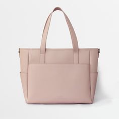 This structured leather tote is the perfect work bag, travel bag, and go anywhere bag. It features a spacious and organized interior for your essentials, a padded compartment for a 15 inch laptop (and 16 inch Macbook Pro), side pockets for your drinks, and you can convert it into a backpack or crossbody. Daily Use Diaper Bag With Luggage Sleeve, Everyday Large Capacity Rectangular Diaper Bag, Modern Laptop Bag With Top Carry Handle For Shopping, Modern Laptop Bag For Shopping, Versatile Rectangular Diaper Bag For Shopping, Functional Shopping Tote Diaper Bag, Functional Tote Diaper Bag For Shopping, Modern Weekender Bag With Luggage Sleeve For Shopping, Modern Large Capacity Rectangular Diaper Bag