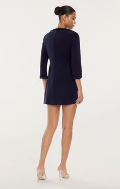 Indulge in luxury and sophistication with the Marlou Dress. This elegant long sleeve mini dress is adorned with delicate tweed fabric along the edges, adding a touch of glamour to your wardrobe. Perfect for any occasion, this dress will make you feel confident and stylish. Fit Details Square necklineLinedFit-and-Flare silhouetteMini lengthLong Sleeve 67% Polyester 27% Rayon 6% SpandexDry Clean Only ImportedLength: 33in/83.82cm, from shoulderMeasurements from size 4 Bridal Jumpsuit, Price Match, Tweed Fabric, Long Sleeve Mini, Sweet Gifts, New Arrival Dress, Long Sleeve Mini Dress, Pretty In Pink, Nice Dresses