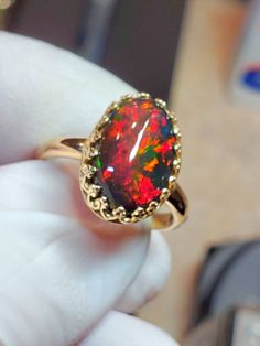 This one's got fire 10x14mm 4.7ct black fire opal looks pretty in the 14k solid gold gallery style bezel ring. Black Fire Opal, Gold Gallery, Black Opal Ring, Future Wardrobe, Ring Opal, Fire Opal Ring, Opal Ring Gold, Black Fire, Solid Gold Ring