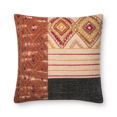 an embroidered pillow with different colors and patterns