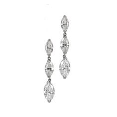 These graduated drop earrings are crafted in platinum. Featuring 6 marquise cut diamonds of F/G Color and VS1 Clarity totaling approximately 2.00 Carats. Measuring 1 inch long, these earrings have pierced posts with friction backs. Marquee Diamond, Marquise Cut Diamond, Diamond Earring, Diamond Drops, Marquise Cut, Diamond Drop Earrings, Diamond Earrings, Free Gifts, 1 Inch