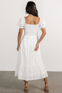 The Piper Eyelet Midi Dress is your go-to staple, seamlessly transitioning from casual outings to special occasions. Crafted from off-white woven material with intricate floral eyelet details, it features a charming sweetheart neckline, smocked bodice, and nursing-friendly design, offering both style and functionality for every moment. Fitted White Dress With Smocked Back, Fitted Midi Dress With Smocked Back And Sweetheart Neckline, Elegant Fitted Smocked Dress With Lace Trim, Daywear Dress With Sweetheart Neckline And Smocked Back, Elegant Smocked Dress With Lace Trim For Spring, White Square Neck Dress With Ruched Bodice, White Dress With Ruched Bodice And Square Neck, Fitted Smocked Dress With Ruched Bodice For Brunch, White Broderie Anglaise Dress With Square Neck