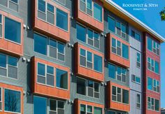 an apartment building with many windows and balconies