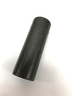 an old black pipe on a white background