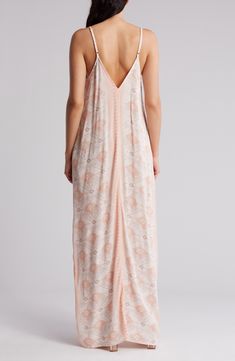 For slimming style and a flattering fit, this maxi slipdress is an easy winner in the wardrobe game. 59" length (size Small/Medium) Slips on over head V-neck Adjustable straps 50% rayon, 50% viscose Dry clean Imported Flowy Unlined Maxi Dress For Daywear, Flowy Daywear Maxi Dress, Daywear Sundress Maxi Dress Unlined, Flowy Maxi Dress With Spaghetti Straps For Daywear, Unlined Maxi Dress For Summer Loungewear, Daywear Longline Maxi Dress, Summer Loungewear Maxi Dress Unlined, Summer Sleep Maxi Dress, Sleeveless Pink Maxi Dress With Side Slits