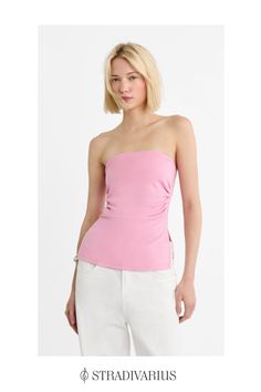 Fitted top with a straight neckline and exposed shoulders. Gathered fabric detail on the sides. Side vents at the hem. Available in several colours. Stretch One-shoulder Top With Built-in Bra, Chic Off-shoulder Summer Tank Top, Chic Bandeau Top With Built-in Bra, Elegant Summer Tops With Straight Neckline, Chic Tank Top With Straight Neckline, Summer Tops With Straight Neckline For Night Out, Elegant Tops With Straight Neckline For Summer, Summer Tops For Night Out With Straight Neckline, Elegant Straight Neckline Summer Tops