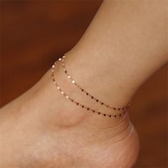 Eternal Lip Chain Anklet — a blend of durability and elegance. Crafted from high-quality 14K gold stainless steel, this anklet features a unique lip chain design that adds a modern touch to your look. With its non-fading finish and versatile color options, this anklet is designed to withstand the test of time while keeping you stylish. Choose from classic steel, luxurious gold, or romantic rose gold to match your personal style. Details: Colour Options: Silver, Gold, Rose Gold Material: 14K Gold Gold Chain Anklets For Summer, Adjustable Metal Anklets With Gold Chain, Minimalist Gold Chain Anklets, Gold Metal Anklet With Adjustable Chain, Trendy Gold Anklet With Adjustable Chain, Gold Chain Metal Anklets As A Gift, Elegant Metal Anklet With Adjustable Chain, Gold Metal Chain Anklets, Gold Chain Metal Anklet, Great For Gifts