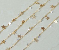 Crystal faceted bead and star drop chain - Gold plated, handmade - Sold by the Foot. Crystal stone size 4mm Star size 7mm Chain size 1.5mm x 1.5mm Drops are approx 15mm apart. Price is for 1 foot. Multiple feet will be sent in one continuous length. Each additional foot ships for 0.35.  Ships from Texas in one business day Gold Necklaces With Star Charm And Round Beads, Gold Necklace With Star Charm And Round Beads, Beautiful Trinkets, Trinkets Jewelry, Star Crystal, Jewelry Chain, Rosary Chain, Chain Gold, Chain Jewelry