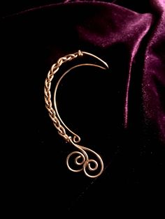 New Original Ear Cuff. An adorable braid with swirls for your ears! NO HOLES OR PIERCINGS NEEDED. Just slip it on and go. It is made to order and will have slight variations. # Item care # I do not coat crowns, hair items or other jewelry with lacquer or other chemicals. They are raw metals. They can be polished with a metal cleaner or dropped in some lemon juice for a bit, toothbrush and toothpaste also polish well, don't forget to rinse or you can turn your goodies green. You may also leave th Vine Jewelry, Toothbrush And Toothpaste, Hair Items, Jewelry Ear, Ear Climber, Wrap Earrings, Ear Climbers, Ear Jacket, Ear Candy