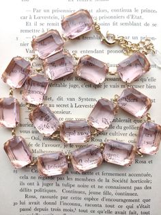 "Beautiful palest pink statement necklace with sparkling octagon crystals are like a ring of blushing roses around your neck. (Minus the thorns!) Inspired by the new Swarovski Millennium necklace and the collet necklaces worn by Anna Wintour. Each glass stone hand set and hand linked with high quality findings. Guaranteed to last a lifetime. Adjustable from 16 to 18\" with lobster claw and a 2\" extender. If you need it longer, just let me know! Each stone is 18 by 13mm, the perfect size to be s Bridgerton Necklace, Jane Austen Gifts, Pink Statement Necklace, Georgian Jewelry, Anna Wintour, Olivia Palermo, Rose Gold Watch, Downton Abbey, Crystal Necklaces