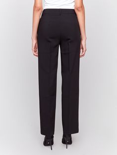 Transform your wardrobe with our chic black pants, expertly designed for the contemporary woman. These pants showcase a trendy straight leg fit and a flattering high-rise waist, ensuring both sophistication and comfort. With just the right amount of stretch, they're perfect for all-day wear. Ideal for office hours or an evening out, these versatile pants are a must-have addition to any wardrobe. Straight leg design Long length Belt loops and 2 front pockets Stretch fabric High-rise waist Black Straight Silhouette Pants For Office, Tailored Black Pants With Straight Silhouette, Black Tailored Straight Silhouette Pants, Tailored Black Straight Pants, Chic Black Pants With Straight Silhouette, Tailored Ankle-length Black Pants, Black Elastane Business Pants, Black Straight Pants For Business Casual, Black Straight Silhouette Pants For Work