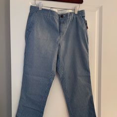 Size 4 Gap Denim Blue Summer Bottoms, Summer Gap Denim Blue Bottoms, Summer Denim Blue Gap Bottoms, Gap Cotton Tapered Leg Jeans, Gap Casual Jeans For Work, Casual Blue Cropped Leg Pants, Casual Striped Straight Leg Bottoms, Gap Relaxed Fit High Rise Bottoms, Casual Striped Tapered Leg Pants