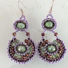 Artisan Czech Glass Bead Drop, Dangle Style Earrings Purple, Green In Glass Beads 2" Long Round Drop Dangle Earrings Handcrafted/No Two Are Exactly Alike Handmade In Guatemala Using Artisan Crafted Czech Glass Beads Easy To Use French Hook Style Closure. Czech Glass Beads Are Know World Wide For Their Quality, Vibrant Colors Please Visit Our Poshmark Boutique To See Our Wide Variety Of Beaded Jewelry Handmade Purple Beaded Earrings, Handmade Bohemian Purple Crystal Earrings, Handmade Purple Bohemian Crystal Earrings, Handmade Purple Amethyst Chandelier Earrings, Handmade Purple Chandelier Earrings As Gift, Purple Dangle Beaded Earrings With Spacer Beads, Handmade Purple Beaded Round Earrings, Handmade Purple Crystal Drop Earrings, Purple Beaded Round Earrings For Gift