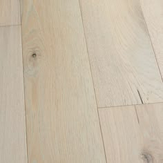 an image of wood flooring that looks like it has been cleaned and is white