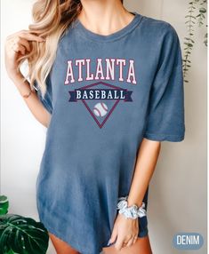 Atlanta  Baseball T Shirt, Atlanta Comfort Colors, Oversized Vintage Style Tee We use ultra-premium Comfort Color garment dyed tees - perfect for giving you a relaxed stylish look. You will love these tees! You can choose from a rich color palette that's as varied as nature itself. If you have any concern about product/design/colors, etc., please do not hesitate to contact us. Choose your t-shirt's color and size on the drop-down menu to the right. You can scroll through the photos to see the size chart and color swatches. ►FEATURES ABOUT THE GARMENT; Super soft, fade resistant, water based, vibrant, direct to garment printing Heavyweight 100% Ring Spun US Cotton Our garments are pre-shrunk during the garment dye and wash processes for almost no shrinkage at home. Garment-dyed ring spun fa Sporty Washed T-shirt With Relaxed Fit, Oversized Crew Neck College Style T-shirt, Sporty Soft-washed T-shirt For Loungewear, Soft-washed Relaxed Fit T-shirt For Athleisure, Sporty Acid Wash Soft-washed T-shirt, Faded Sporty Top, Faded Washed Sporty Top, Sporty Acid Wash Short Sleeve Tops, Faded Casual T-shirt With Screen Print