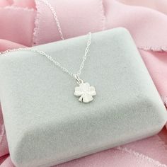 A simple and elegant sterling-silver Four Leaf Clover, a perfect lucky charm to wear during the day. The Clover Pendant is dainty, very lightweight and would be perfect for layering or as a stand-alone necklace. * D E T A I L S * * 10mm charm * Sterling Silver * Dainty Style * 3 chain lengths available (16, 18, and 20 inch) L I K E ∙ W H A T ∙ Y O U ∙ S E E ? More Clover Jewelry * https://etsy.me/2v16Q1K More Necklaces * https://etsy.me/2PEnETk More from our shop * https://etsy.me/2vasKjo Are yo Lucky Four Leaf Clover, Silver Initial Charms, Lucky Charm Necklace, Clover Jewelry, Dainty Style, Pretty Jewelry Necklaces, Celtic Pendant, Four Leaf Clover Necklace, Signature Necklace