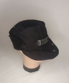 An original men's cap made by recycling jeans. The design of the cap is unique, I tried to keep interesting details - pockets, zippers, buttons and in my opinion it worked. The cap is made in patchwork style. The cap has a black cotton lining. The visor is made of plastic. There are ears on the sides of the hat that can be pulled down if desired. The ears are attached with Velcro. The ear guards will protect your ears from wind and rain. The hat is suitable for a man leading an active lifestyle, Lumberjack Hat, Recycling Jeans, Men's Cap, Hat With Ears, Denim Cap, Hunting Hat, Recycle Jeans, Fisherman Hat, Wind And Rain