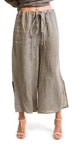 This comfy Linen pant comes with an elastic draw string waistband for custom fit. 100% Linen Model is 5'8 One Size Made in Italy Relaxed Spring Bottoms With Drawstring, Spring Capri Pants With Loosely Fitted Hips, Relaxed Fit Cotton Bottoms With Tie Waist, Spring Relaxed Fit Bottoms With Drawstring, Solid Capri Length Pants With Relaxed Fit, Solid Color Relaxed Fit Capri Pants, Summer Bottoms With Elastic Side Panels And Loose Fit, Relaxed Fit Tie Waist Long Bottoms, Comfortable Straight Leg Bottoms With Drawstring