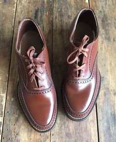 "Vintage boys Star Value Jr brown lace oxfords. Excellent condition with barely a sign of wear. Original box included, but it does show a lot fo wear. These date to circa 1940s. The insole is 8-1/8\" long and according to size charts, converts to a youth size 2, approximately in the 7 to 8 year range. Measurements: bottom of sole 9-1/4\" long 3-1/2\" across ball of foot insole 8-1/8\" long" Vintage Brown Lace-up Shoes With Rubber Sole, Vintage Brown Lace-up Business Shoes, Vintage Low-top Oxfords For Workwear, Retro Brown Oxfords For Work, Retro Wingtip Lace-up Shoes With Brogue Detailing, Retro Wingtip Brogue Lace-up Shoes, Retro Brogue Oxfords With Closed Toe, Retro Brogue Detailing Closed Toe Oxfords, Vintage Low-top Lace-up Shoes With Brogue Detailing