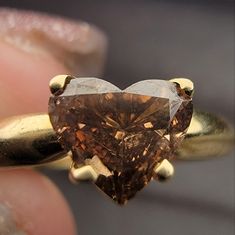 This Beauty Is Near 1 Carat Natural Brown Diamond Engagement Ring Crafted In 14k Solid Yellow Gold And Heart Shaped Which Is Hard To Find. The Ring Is Stamped At 585. Brown Diamond Engagement Ring, Brown Rings, Brown Diamonds, Yellow Gold Color, Ring Crafts, Brown Diamond, Natural Brown, 1 Carat, Womens Jewelry Rings