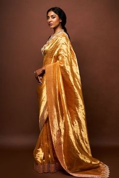 Sunset yellow scallop border saree featuring pearl and cutdana work. Paired with a mulberry wine pearl, cutdana embroidered blouse and a petticoat. - Aza Fashions Elegant Tussar Silk Blouse With Dori Work, Silk Blouse Piece With Gota Work For Reception, Elegant Pre-draped Saree With Gota Work For Navratri, Elegant Blouse With Gota Work In Traditional Drape, Anarkali Silk Saree With Gota Work, Fitted Silk Saree With Gota Work, Gold Pre-draped Saree With Dori Work, Elegant Tussar Silk Saree With Gota Work, Wedding Tussar Silk Blouse Piece With Gota Work