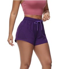 Experience ultimate comfort and support during your workouts with these Women's Running Shorts. Featuring built-in mesh briefs and an adjustable elastic waistband, these athletic shorts are designed for a secure and customizable fit. Two zippered side pockets provide convenient storage for your keys, bank cards, and other small essentials, ensuring you can focus on your fitness goals without any distractions. Purple Short Leg Activewear For Workout, Purple Athleisure Athletic Shorts For Workout, Purple Short Length Activewear For Sports, Casual Purple Activewear With Short Leg, Casual Purple Short Leg Activewear, Purple Short Leg Activewear For Summer, Purple Stretch Athletic Shorts For Summer, Purple Athleisure Athletic Shorts With Elastic Waistband, Breathable Running Shorts