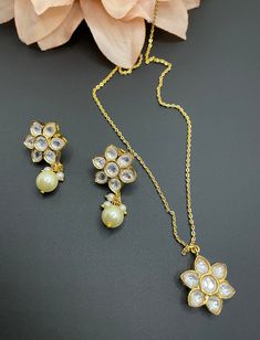 This is a unique kundan set that is so perfect to gift to the special person you would like! It is made of high quality uncut stones and has a gold finish but is extremely elegant to wear even for everyday use. Grab this gorgeous piece soon as I have limited stock! Traditional Kundan Necklace With Gota Work As Gift, Temple Jewelry Necklace With Gota Work As Gift, White Kundan Necklace With Meenakari For Gift, White Kundan Jewelry Sets As Gift, Gold Jewelry Sets With Gota Work For Gifts, Kundan Necklace With Pearl Pendant For Diwali Gift, Silver Kundan Necklace With Gota Work For Gift, Kundan Necklace For Diwali Gift, Kundan Necklace As A Diwali Gift