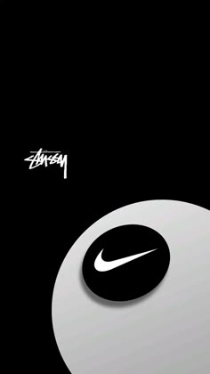 a black and white photo with the nike logo on it's back cover,