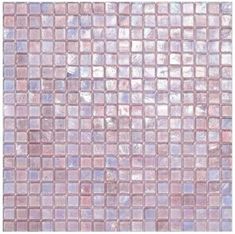 a close up view of a pink glass mosaic tile