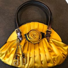 Beautiful Stylish Gold Silk Dolce & Gabbana Small Flower Vintage Handbag With Brown Leather Handles. Small, Best For Evening Wear- Around 11x4 Inches. Black Silk Interior. Minimal Wear, Visible In Pictures. Designer Gold Bag With Handle Drop, Elegant Yellow Bag With Gold-tone Hardware, Elegant Yellow Bag With Detachable Strap, Yellow Evening Bags With Handles, Formal Yellow Bags With Gold-tone Hardware, Yellow Evening Satchel With Double Handle, Evening Yellow Satchel With Double Handle, Elegant Yellow Bag With Detachable Handle, Elegant Yellow Pouch Shoulder Bag